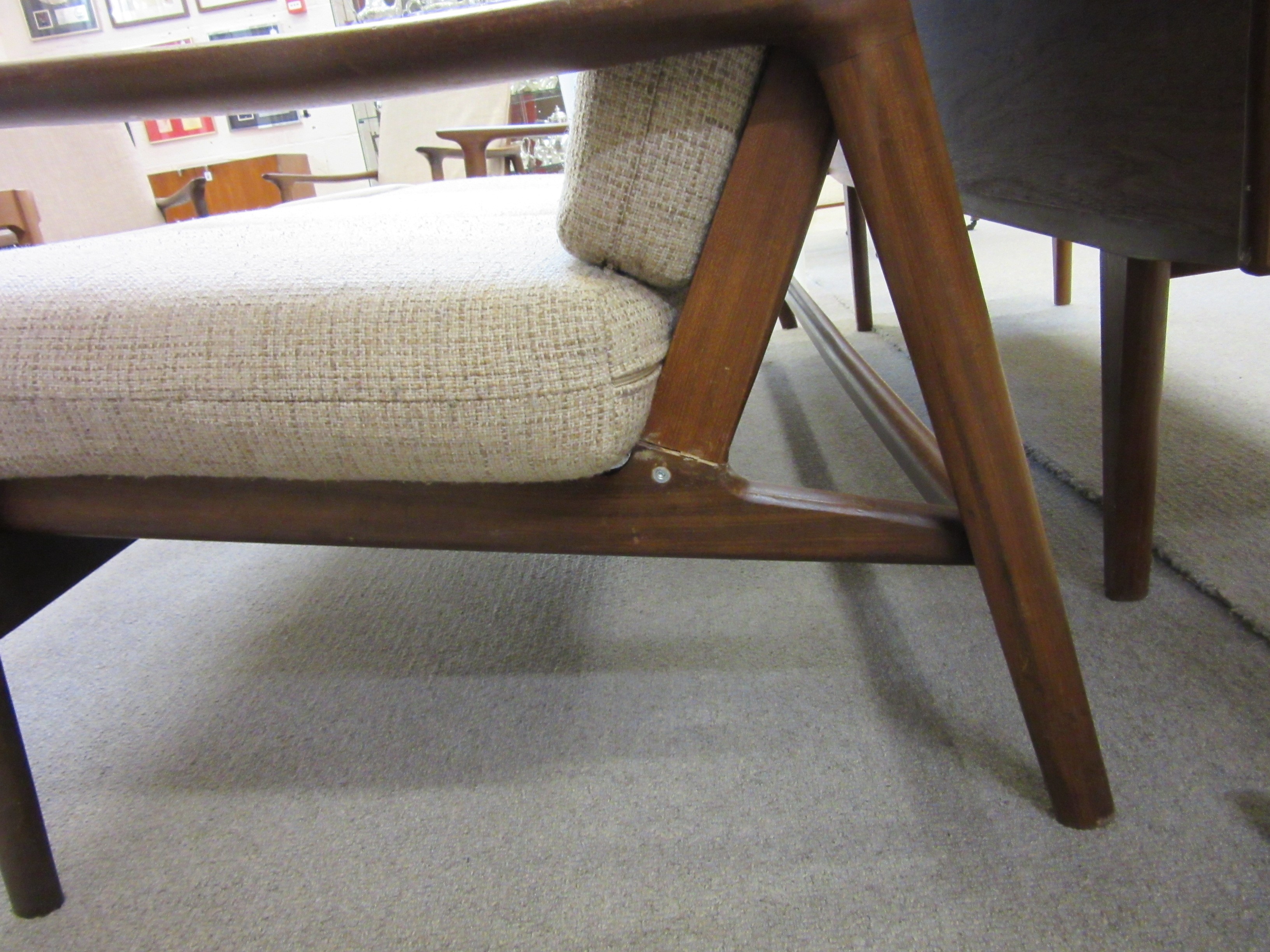 A TEAK FRAMED LOUNGE SUITE probably Guy Rogers New York Image