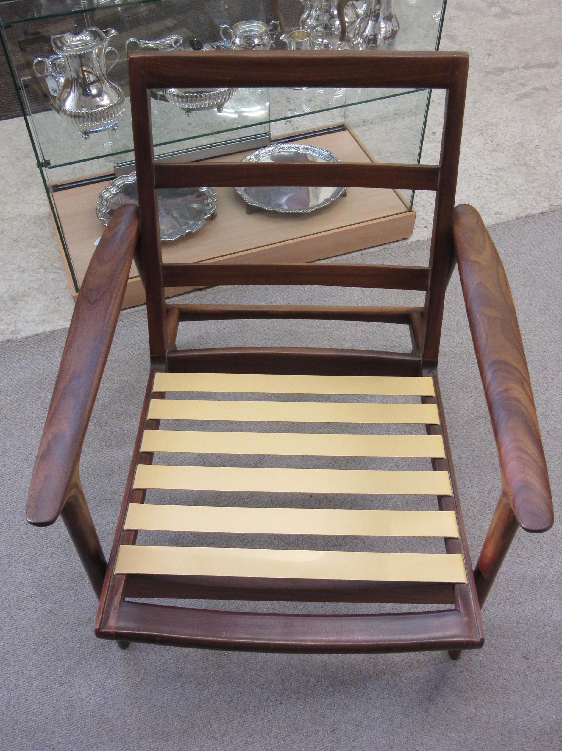 A TEAK FRAMED LOUNGE SUITE probably Guy Rogers New York Image