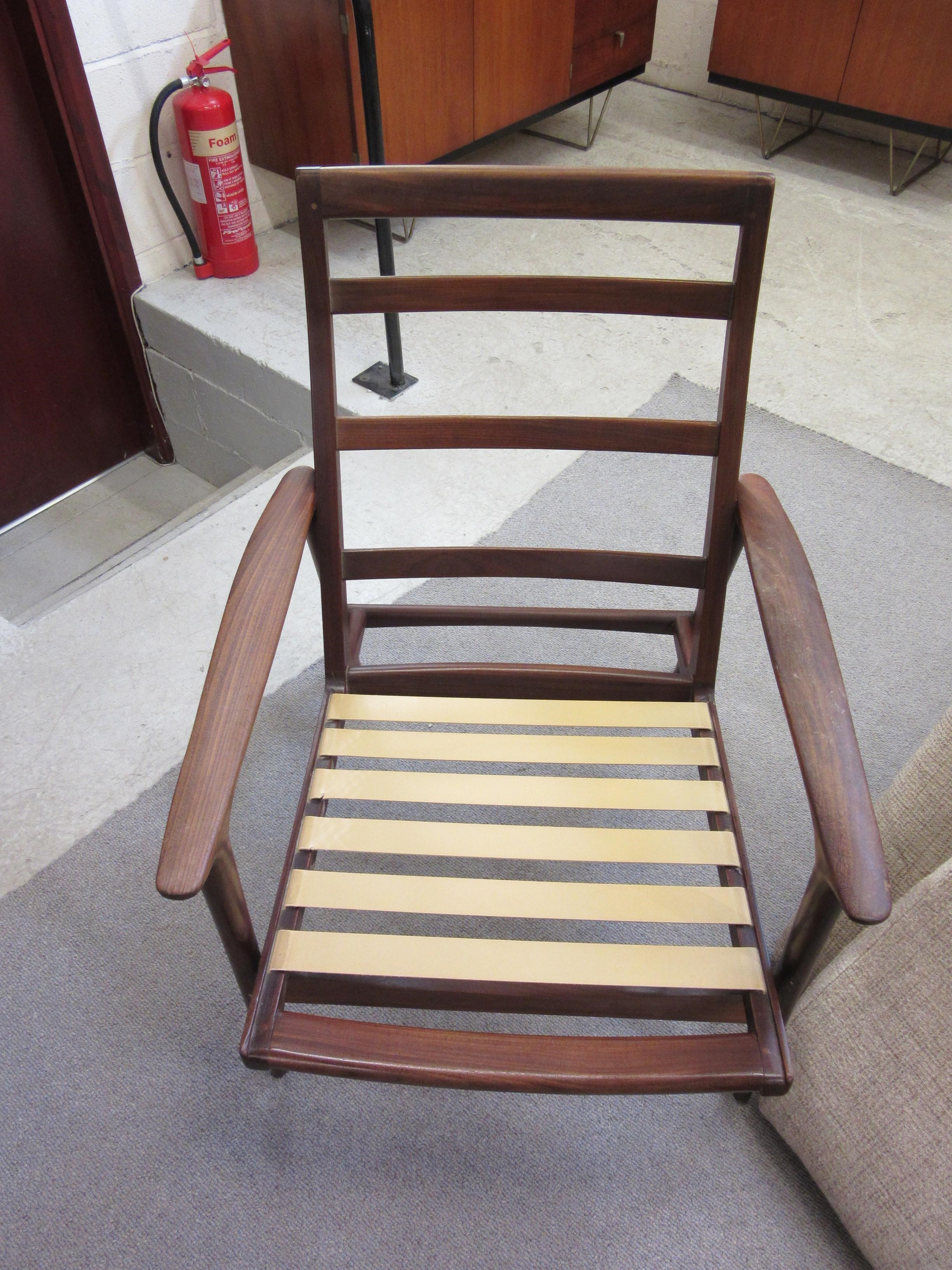 A TEAK FRAMED LOUNGE SUITE probably Guy Rogers New York Image