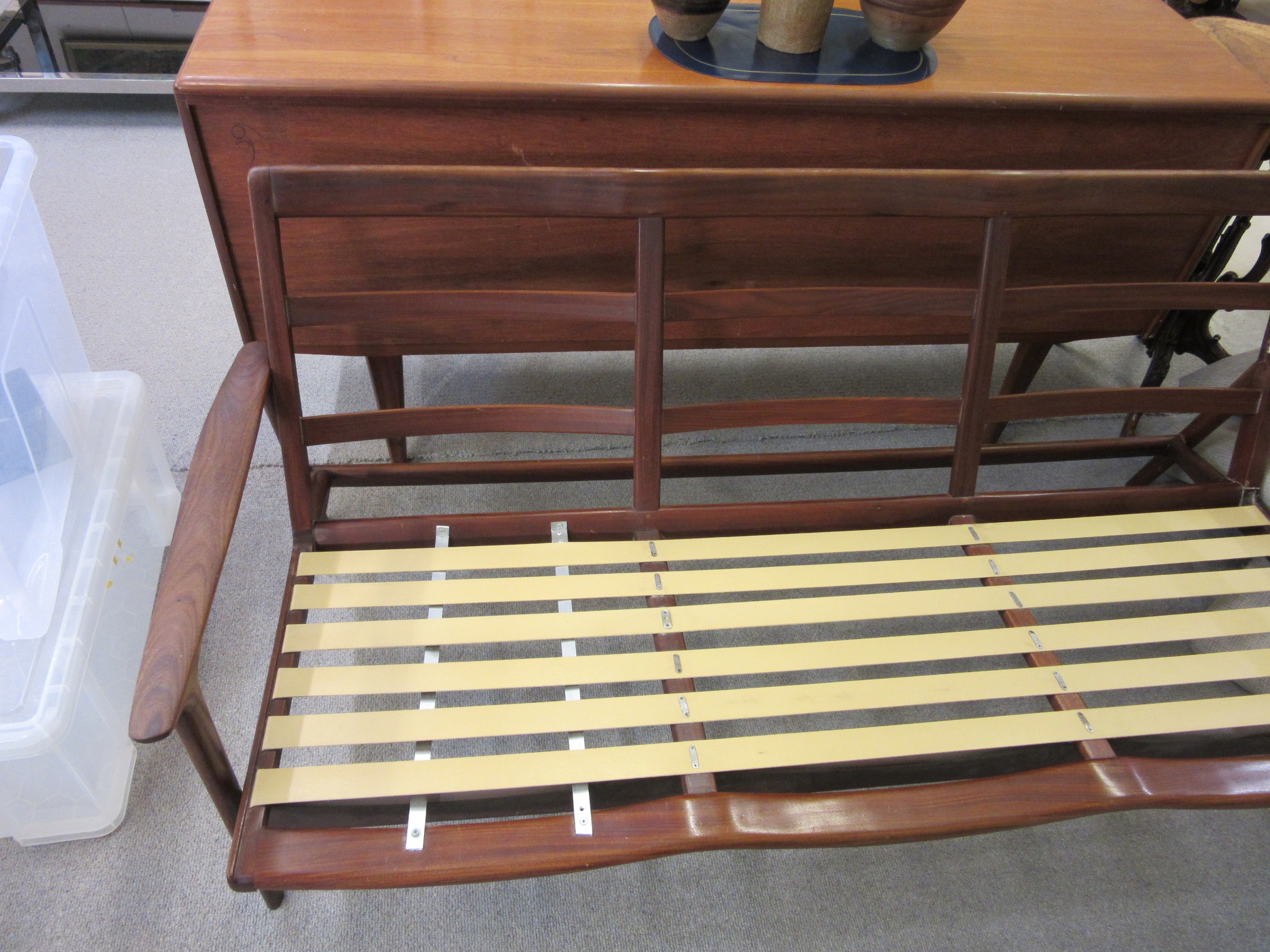 A TEAK FRAMED LOUNGE SUITE probably Guy Rogers New York Image