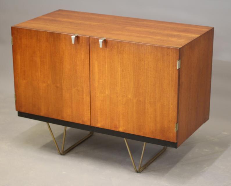A SMALL STAG S RANGE TEAK CABINET BY JOHN & SYLVIA REED Image