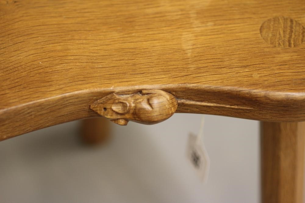 A ROBERT THOMPSON ADZED OAK COW STOOL Image