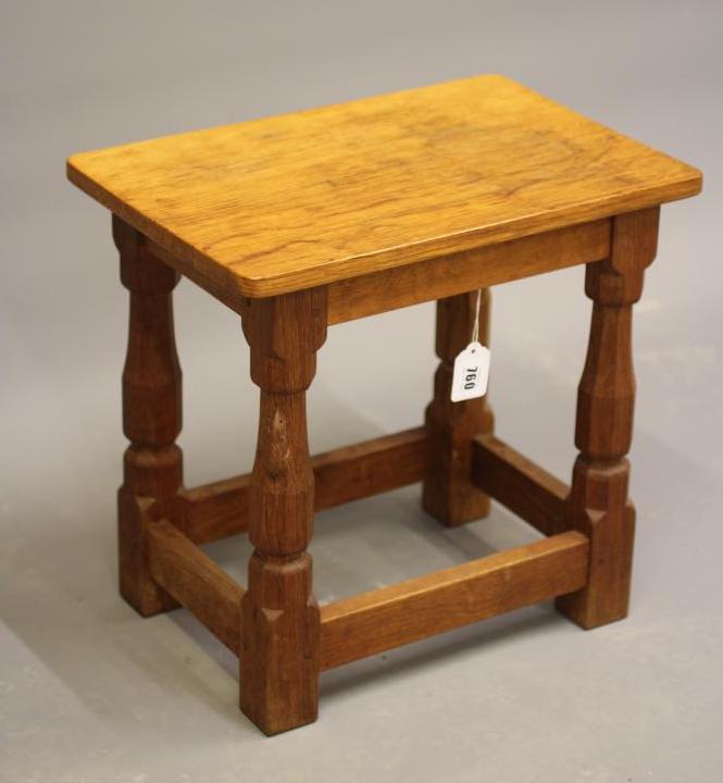 A ROBERT THOMPSON ADZED OAK STOOL Image