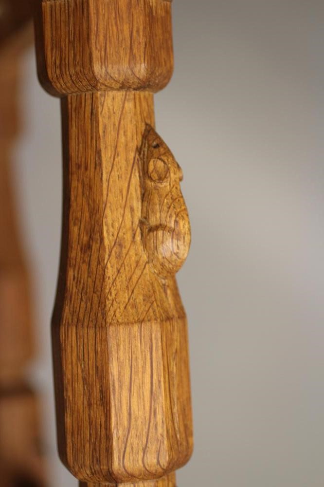 A ROBERT THOMPSON ADZED OAK STOOL Image