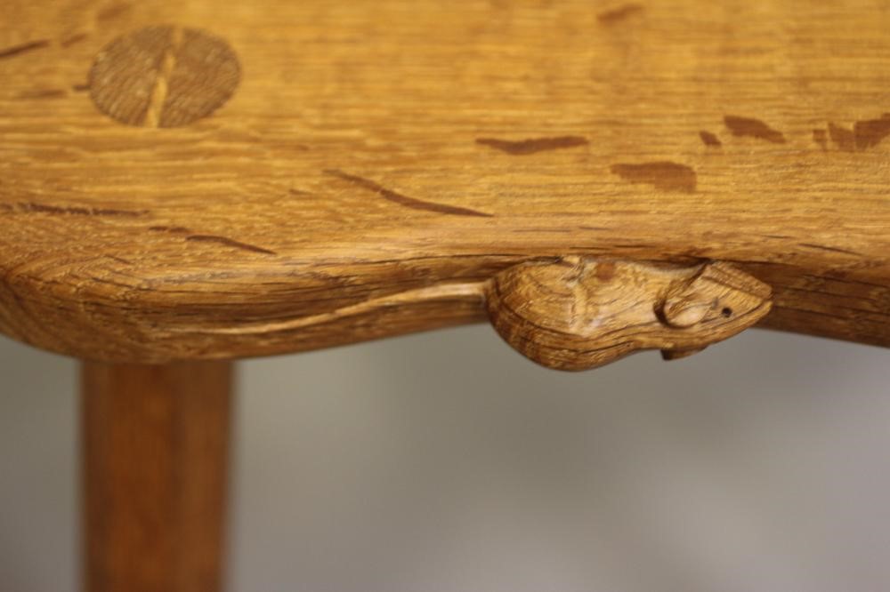 A ROBERT THOMPSON ADZED OAK COW STOOL Image