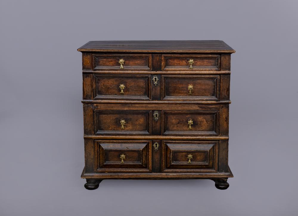 A JOINED OAK GEOMETRIC CHEST in two sections Image
