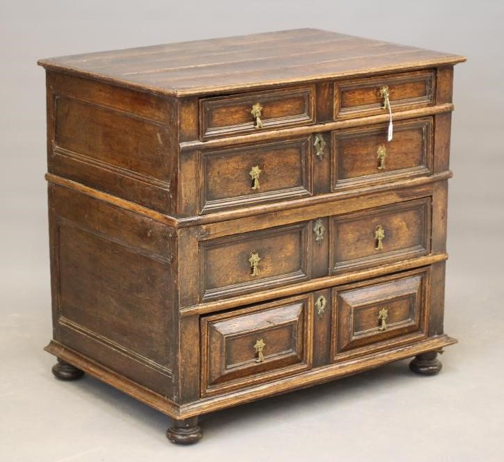 A JOINED OAK GEOMETRIC CHEST in two sections Image