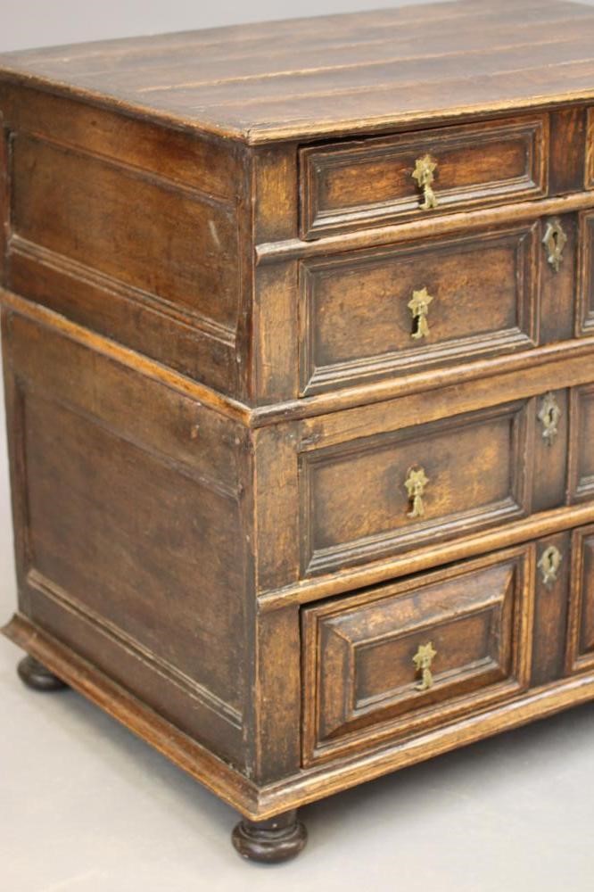 A JOINED OAK GEOMETRIC CHEST in two sections Image