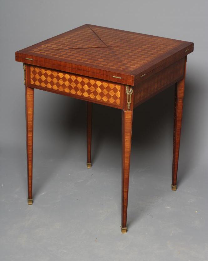 A LOUIS XVI STYLE MAHOGANY AND PARQUETRY ENVELOPE CARD TABLE Image