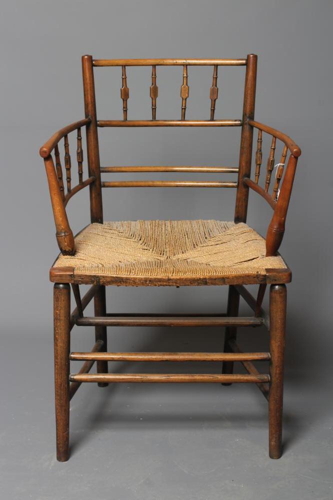 PHILIP WEBB FOR MORRIS & CO. - A "SUSSEX" ARMCHAIR in ash and beech with string seat and traces of Image
