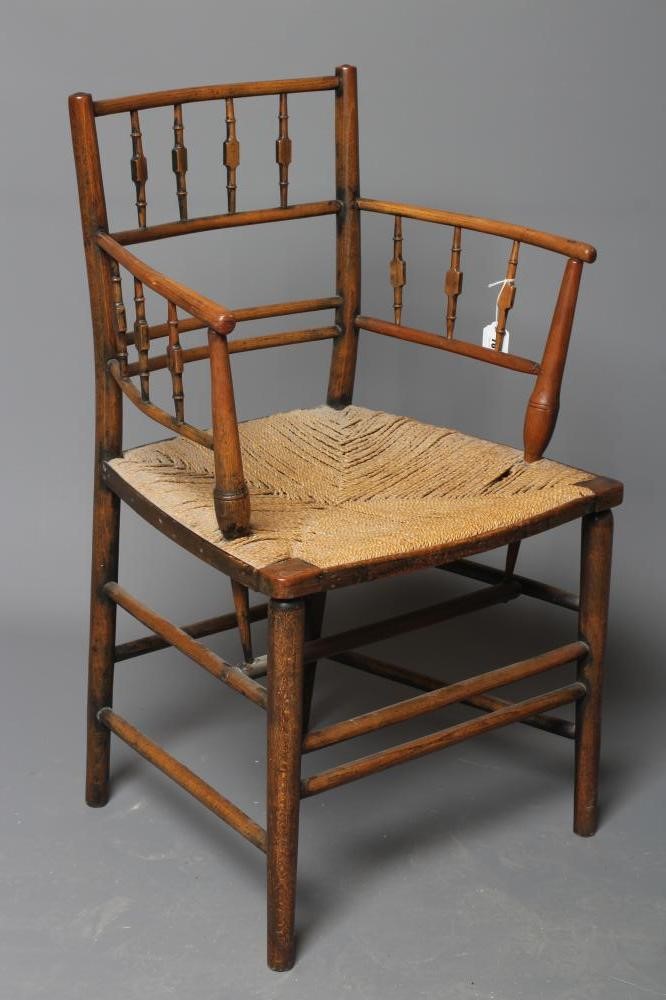 PHILIP WEBB FOR MORRIS & CO. - A "SUSSEX" ARMCHAIR in ash and beech with string seat and traces of Image