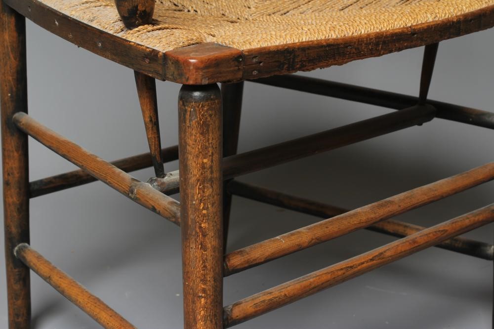 PHILIP WEBB FOR MORRIS & CO. - A "SUSSEX" ARMCHAIR in ash and beech with string seat and traces of Image