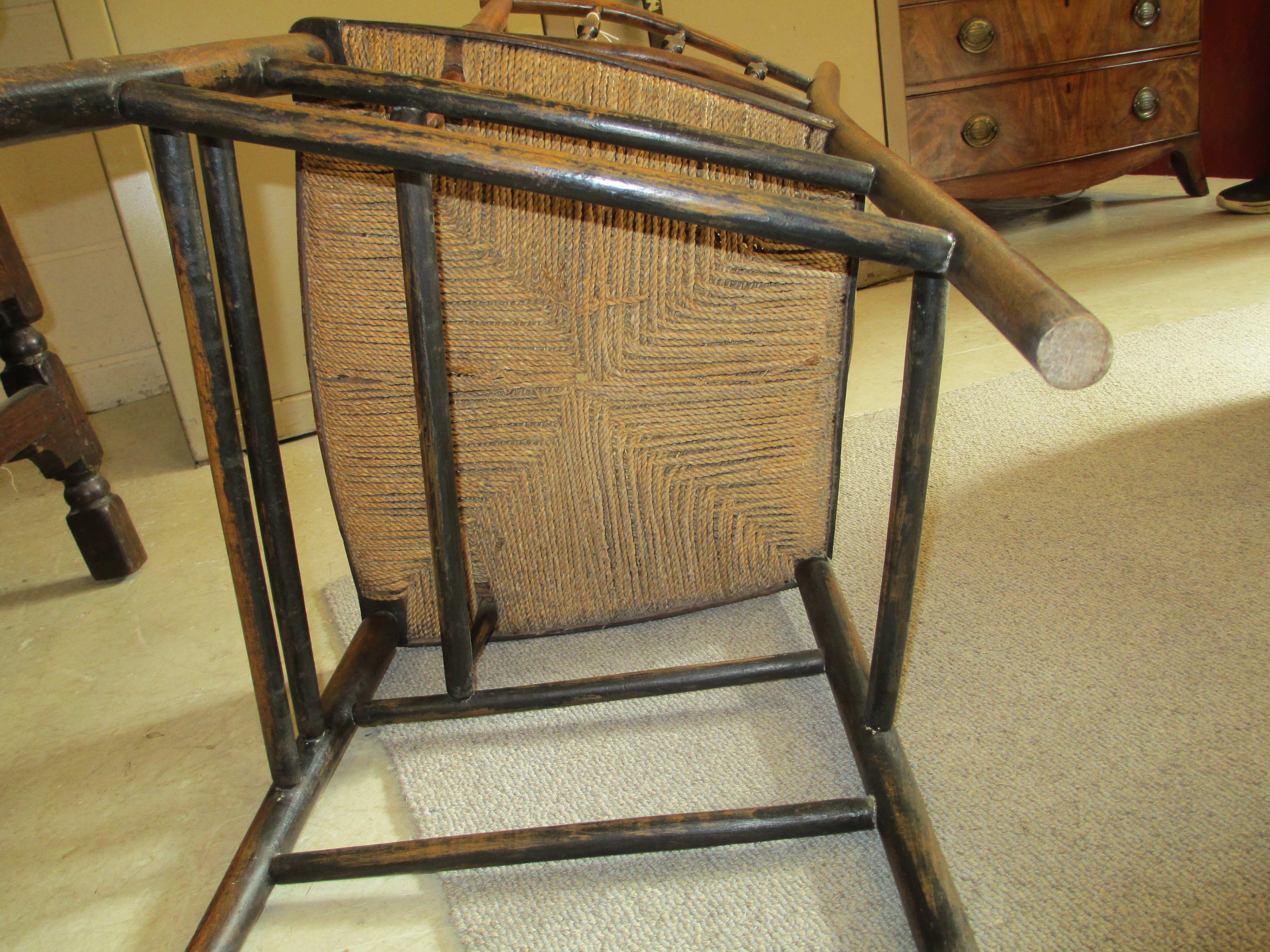 PHILIP WEBB FOR MORRIS & CO. - A "SUSSEX" ARMCHAIR in ash and beech with string seat and traces of Image
