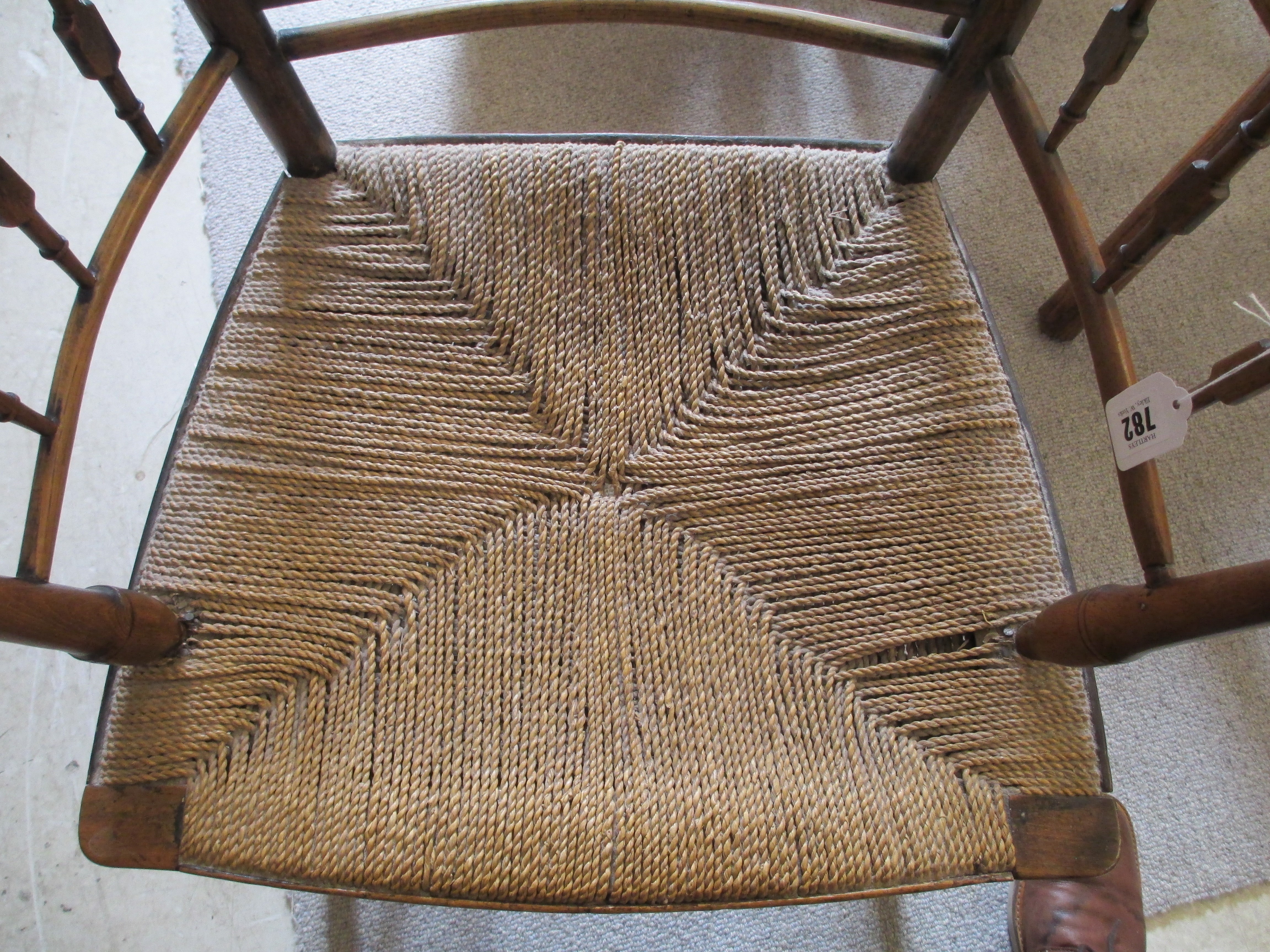 PHILIP WEBB FOR MORRIS & CO. - A "SUSSEX" ARMCHAIR in ash and beech with string seat and traces of Image