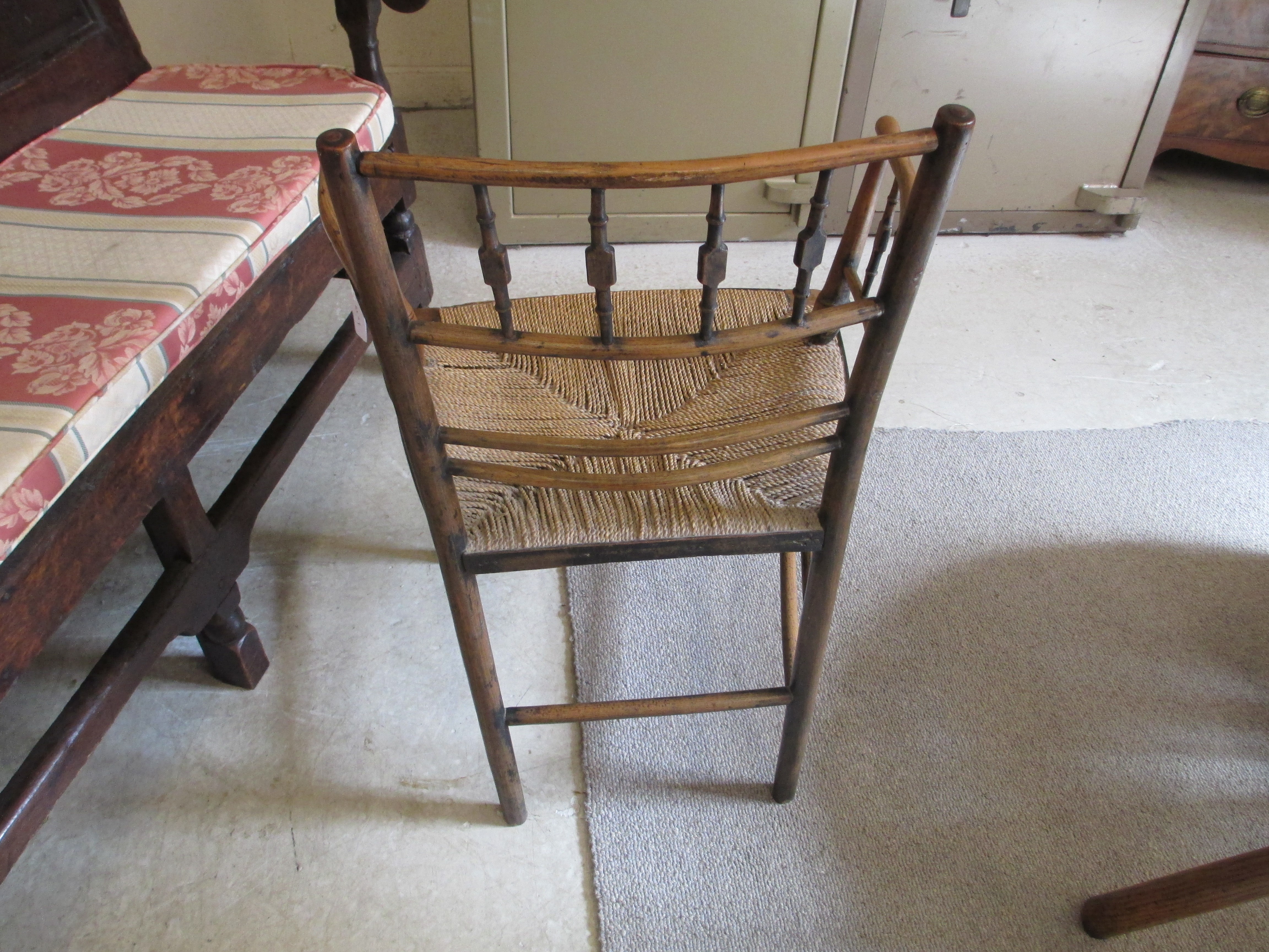 PHILIP WEBB FOR MORRIS & CO. - A "SUSSEX" ARMCHAIR in ash and beech with string seat and traces of Image