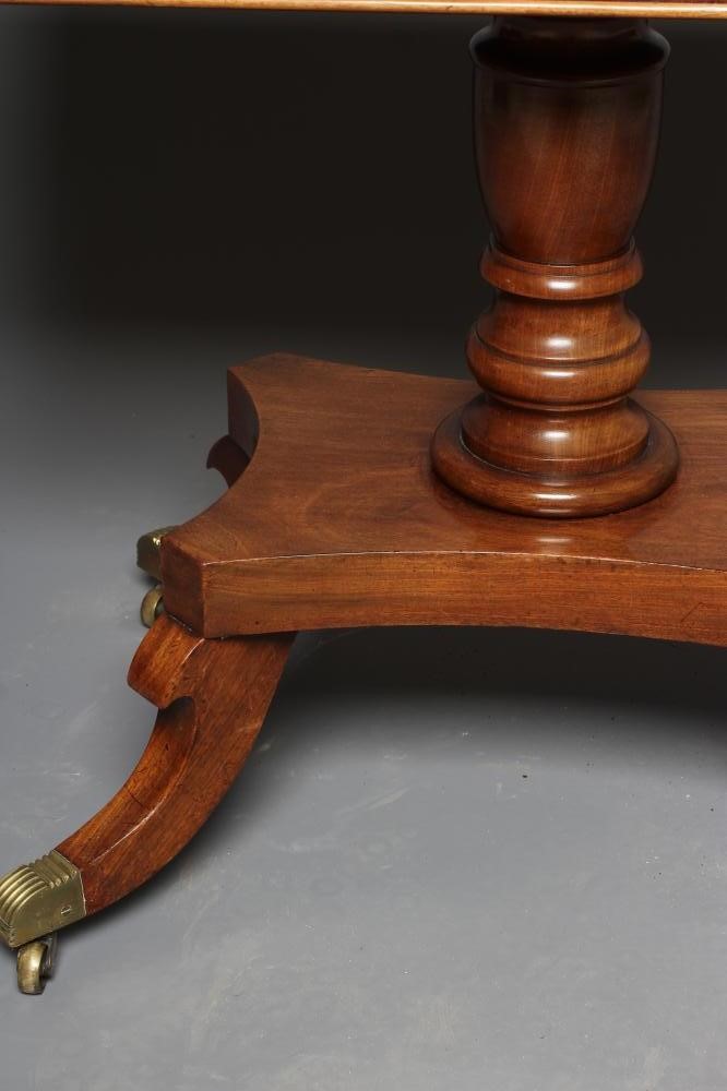 A GEORGIAN MAHOGANY FOLDING TEA TABLE Image