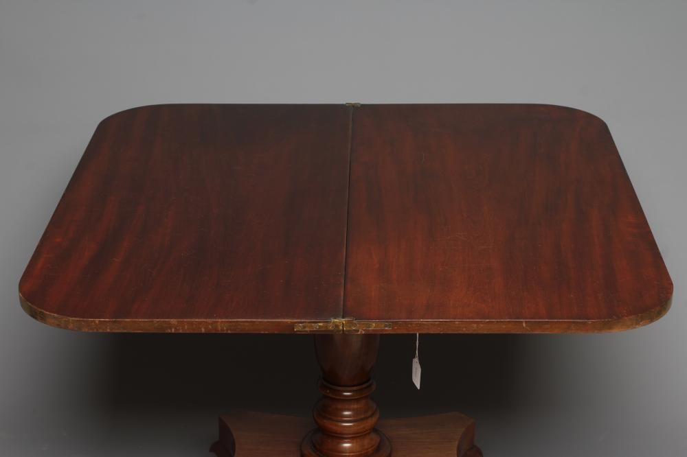 A GEORGIAN MAHOGANY FOLDING TEA TABLE Image