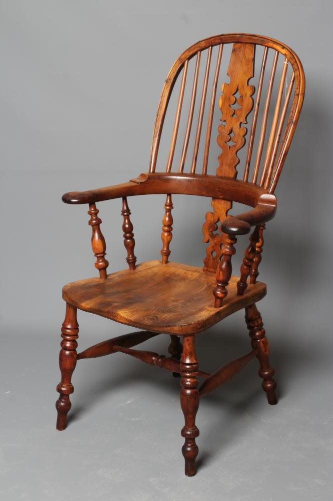 A YEW AND ELM BROAD ARM WINDSOR ARMCHAIR Image