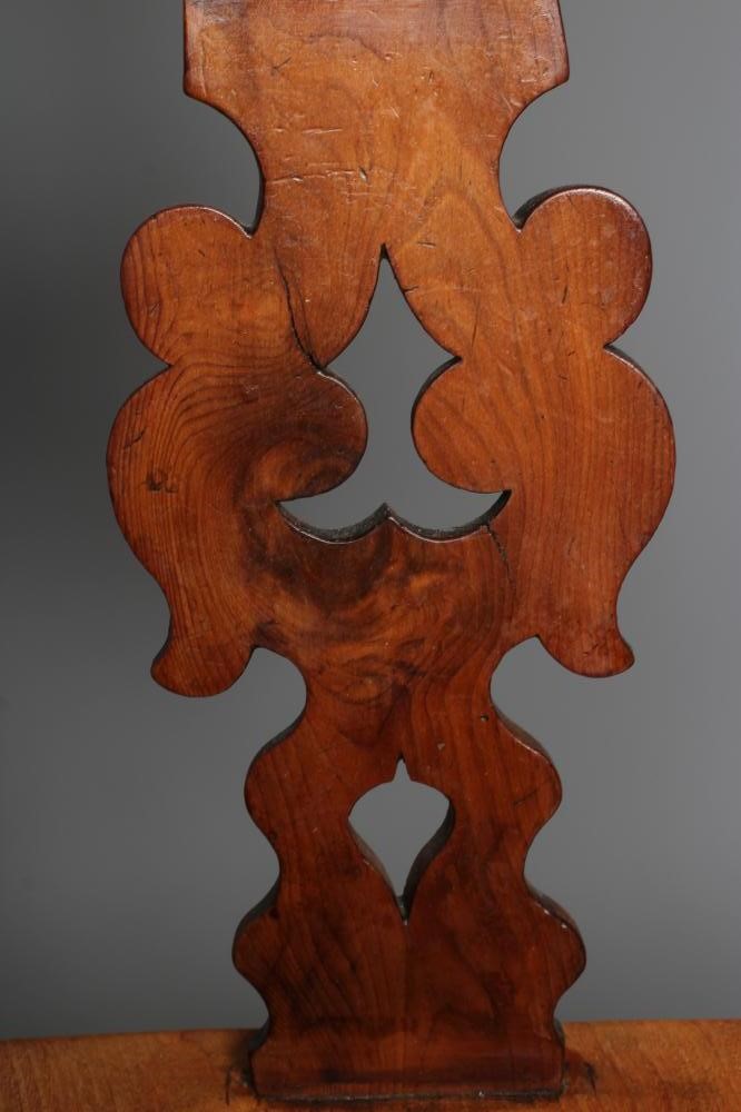 A YEW AND ELM BROAD ARM WINDSOR ARMCHAIR Image