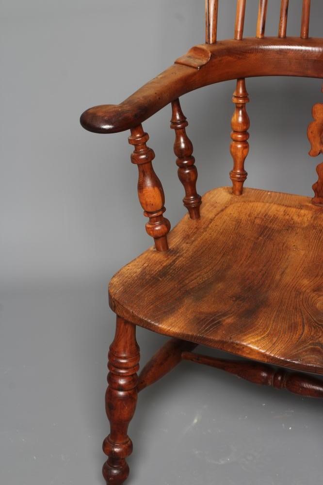 A YEW AND ELM BROAD ARM WINDSOR ARMCHAIR Image