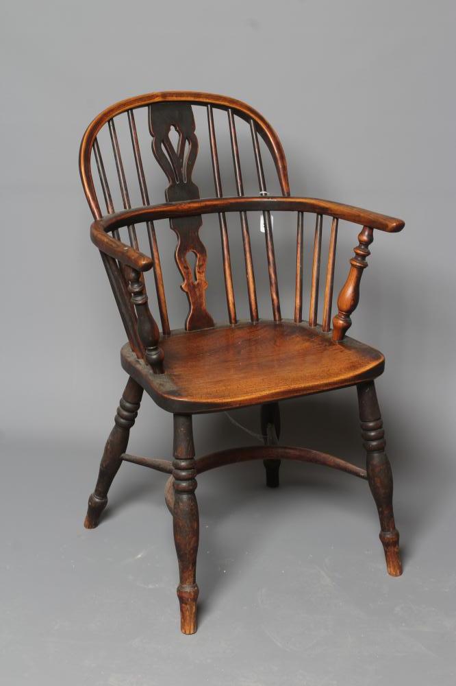 AN ASH AND ELM HOOPED WINDSOR ARMCHAIR Image
