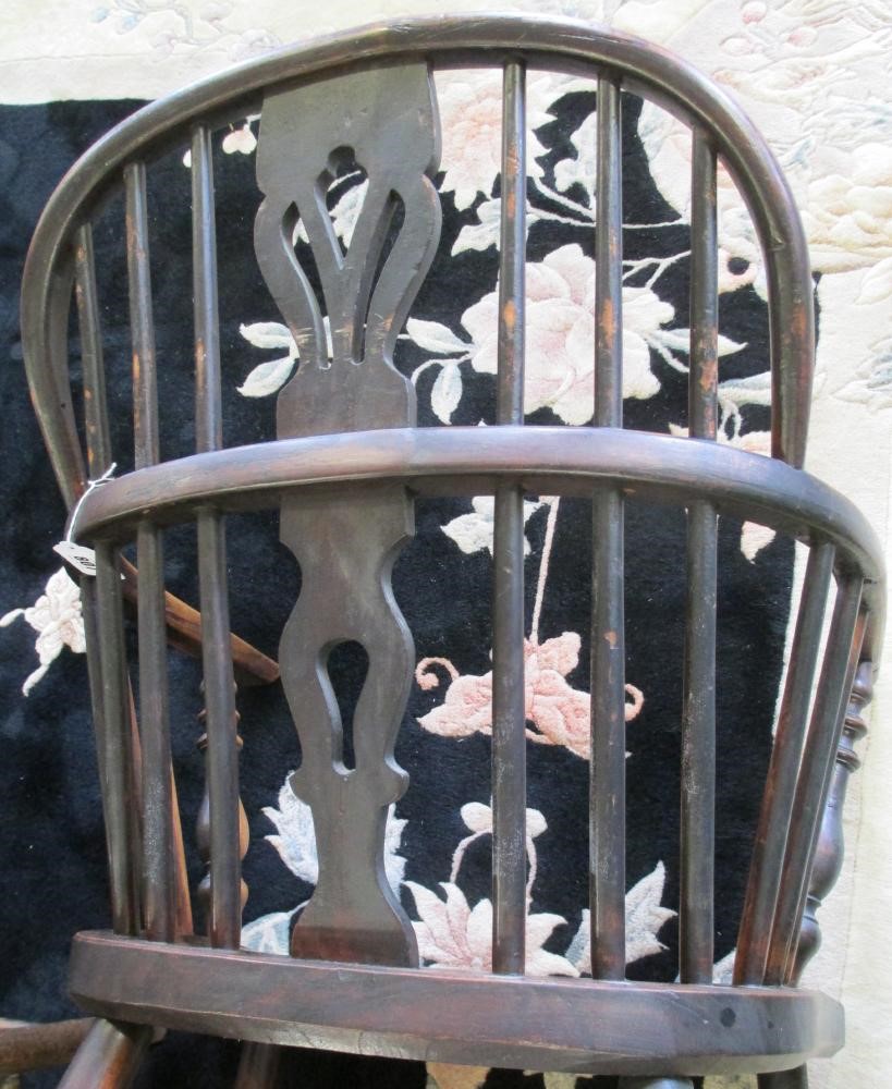 AN ASH AND ELM HOOPED WINDSOR ARMCHAIR Image