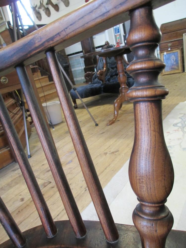 AN ASH AND ELM HOOPED WINDSOR ARMCHAIR Image