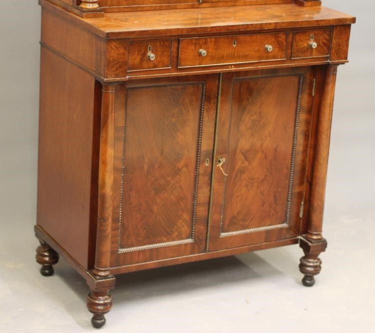 A SMALL LATE GEORGIAN MAHOGANY CABINET Image