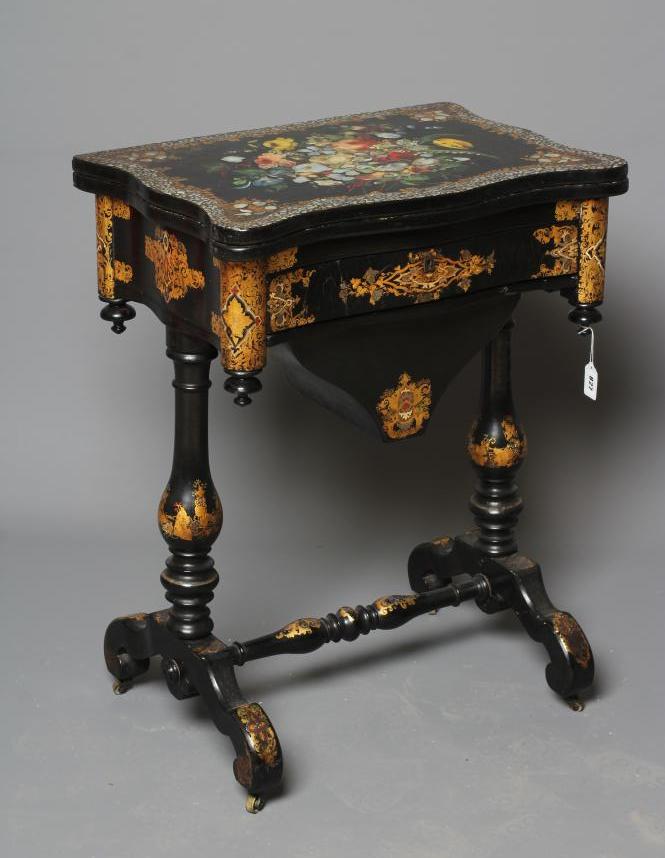A VICTORIAN PAPIER MACHE WORK/GAMES TABLE Image