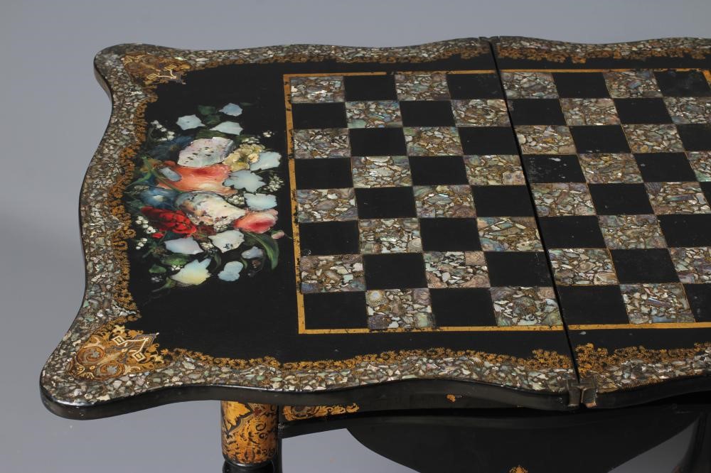 A VICTORIAN PAPIER MACHE WORK/GAMES TABLE Image
