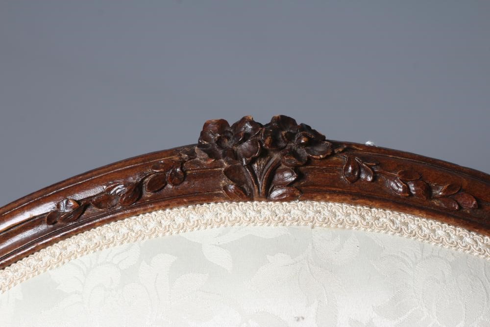 A STAINED BEECH ARMCHAIR Image
