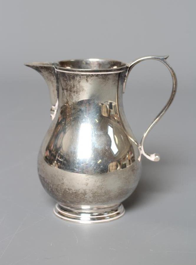 A MODERN SPARROW BEAK JUG by Spink & Son, London 1978, with S scroll handle, 3 1/2" high, 5ozs 6dwts Image