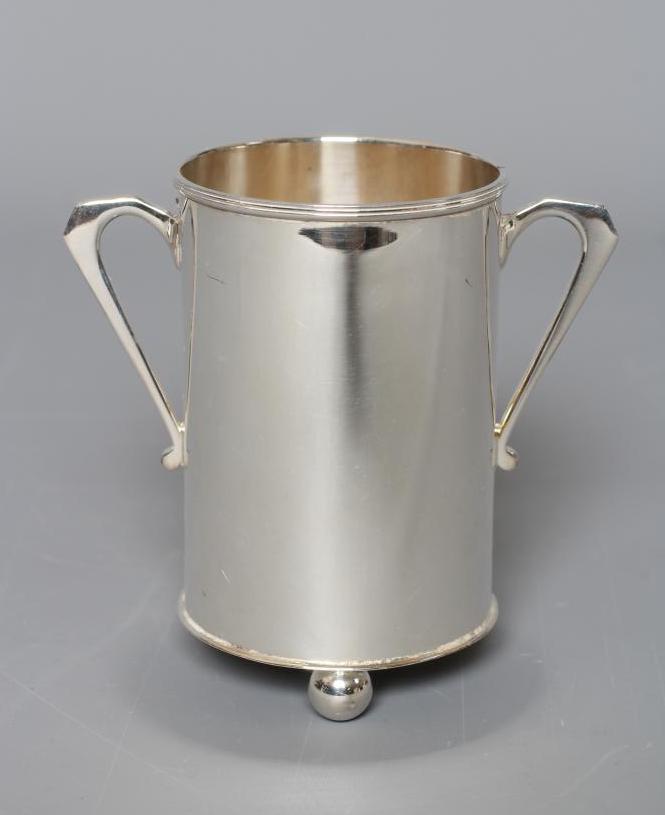AN ART DECO SMALL BOTTLE HOLDER by S J Levi & Co., Birmingham 1939, of plain cylindrical form with Image