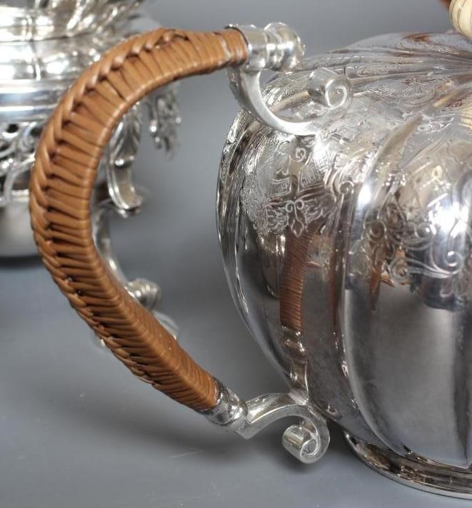 A FIVE PIECE TEA SERVICE by Elkington & Co. Image