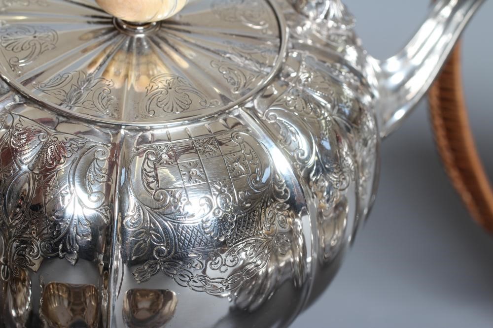 A FIVE PIECE TEA SERVICE by Elkington & Co. Image