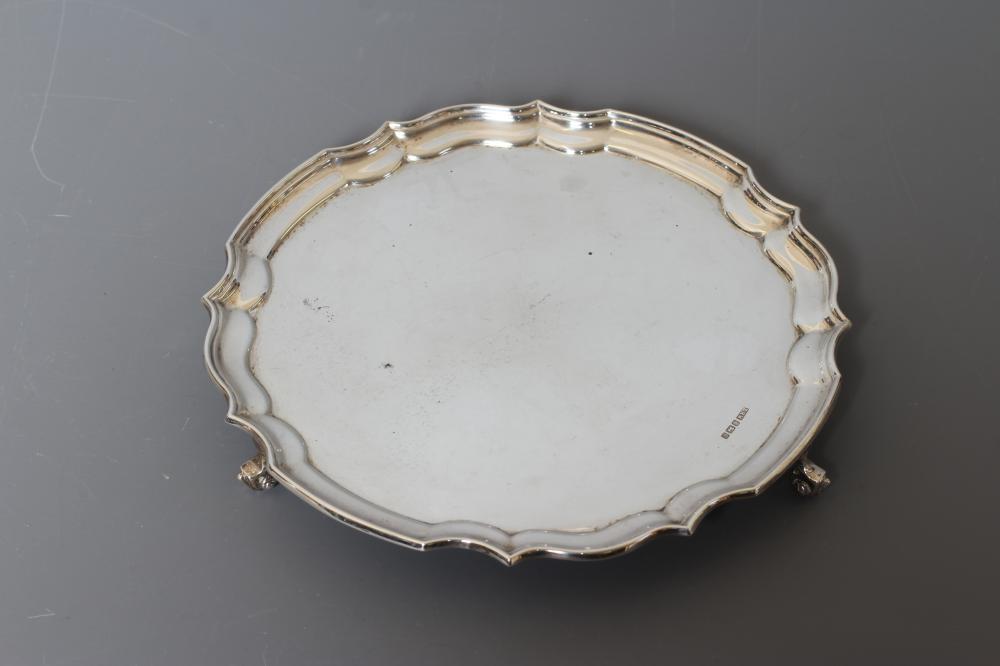 A SALVER by Laurence R Watson & Co., Sheffield 1989, of shaped circular form with pie-crust rim and Image