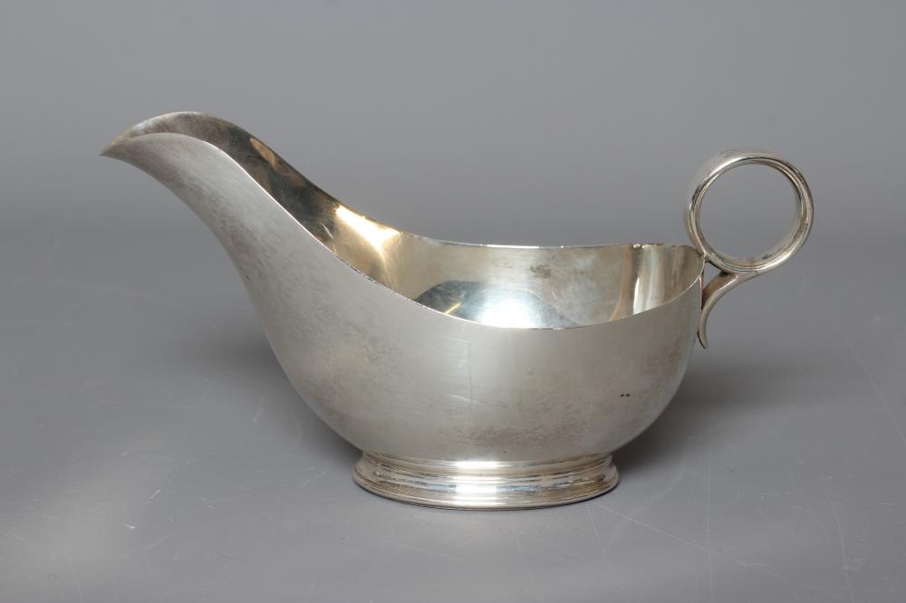 AN ART DECO OVAL SAUCEBOAT by James Dixon & Sons Ltd., Sheffield 1936, with plain circular handle on Image