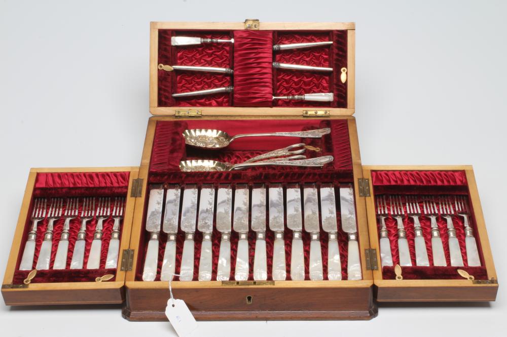 A LATE VICTORIAN EPNS DESSERT SERVICE comprising twelve pairs of fruit knives and forks with ivy Image