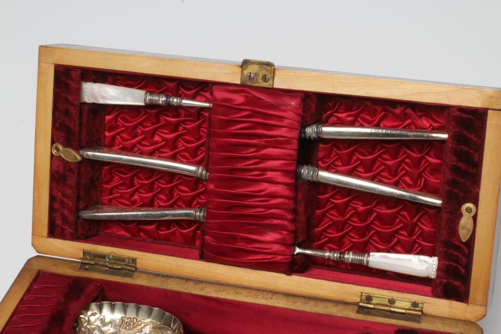 A LATE VICTORIAN EPNS DESSERT SERVICE comprising twelve pairs of fruit knives and forks with ivy Image