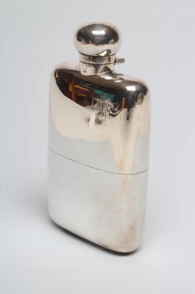 A LATE VICTORIAN SILVER HIP FLASK Image