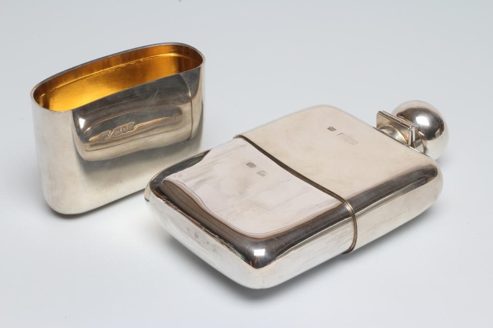 A LATE VICTORIAN SILVER HIP FLASK Image