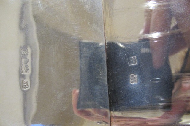 A LATE VICTORIAN SILVER HIP FLASK Image