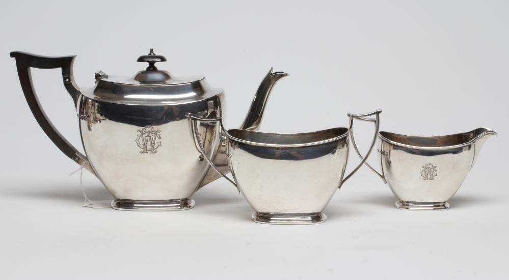 A SILVER THREE PIECE TEA SERVICE Image