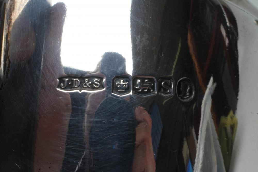 A SILVER THREE PIECE TEA SERVICE Image