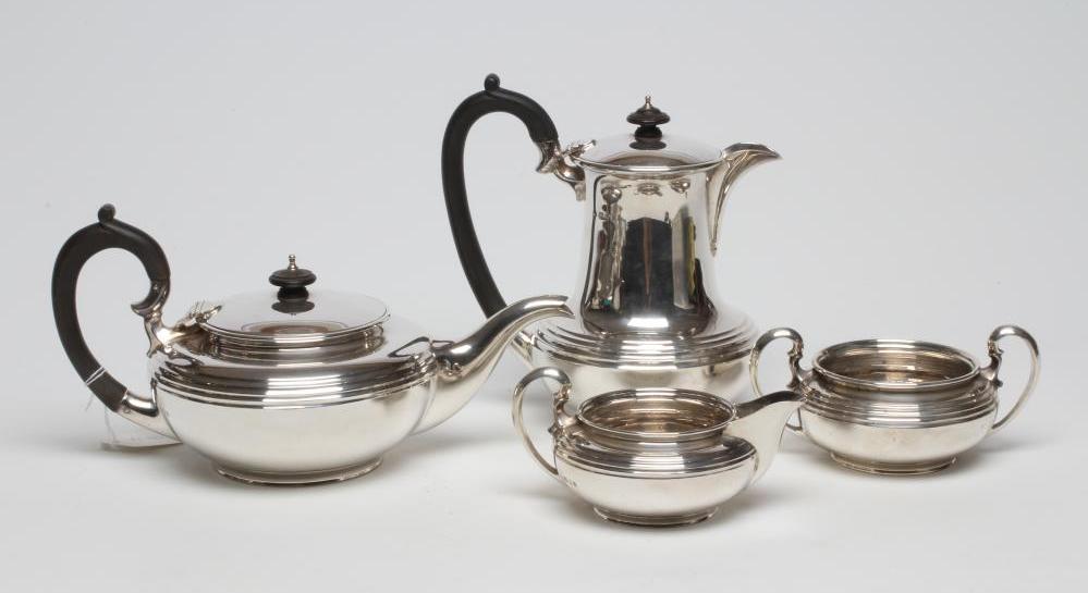 A SILVER FOUR PIECE TEA AND COFFEE SERVICE Image