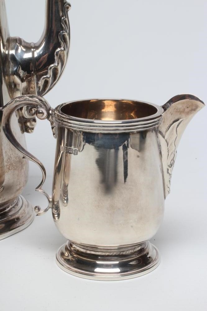 A SILVER THREE PIECE COFFEE SET Image