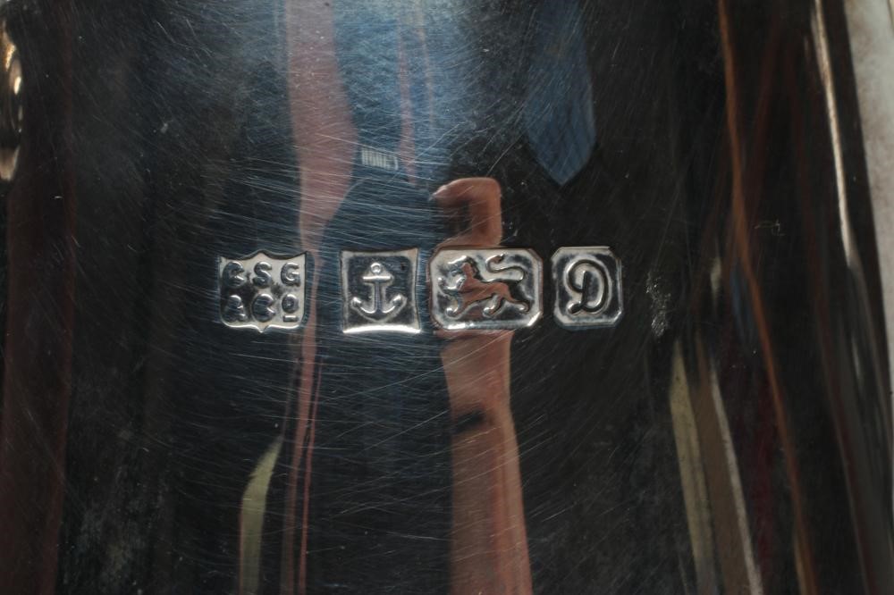 A SILVER THREE PIECE COFFEE SET Image