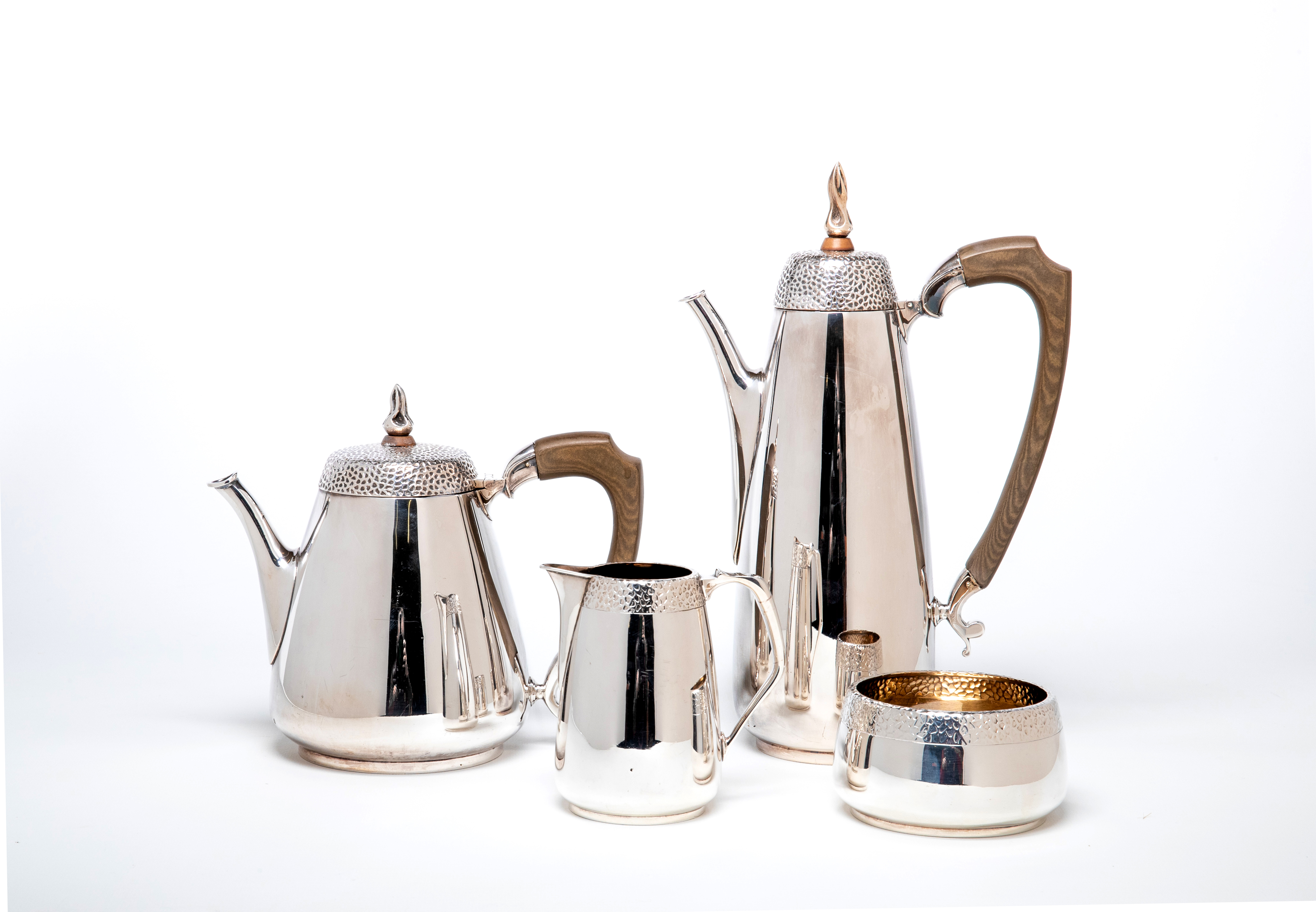 A FOUR PIECE SILVER TEA SERVICE Image