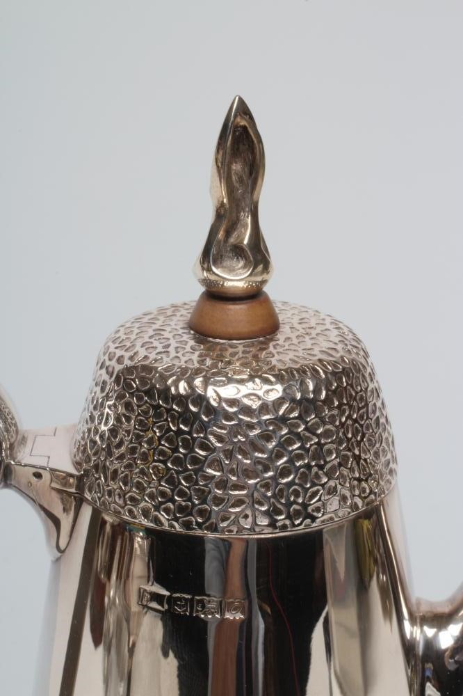 A FOUR PIECE SILVER TEA SERVICE Image