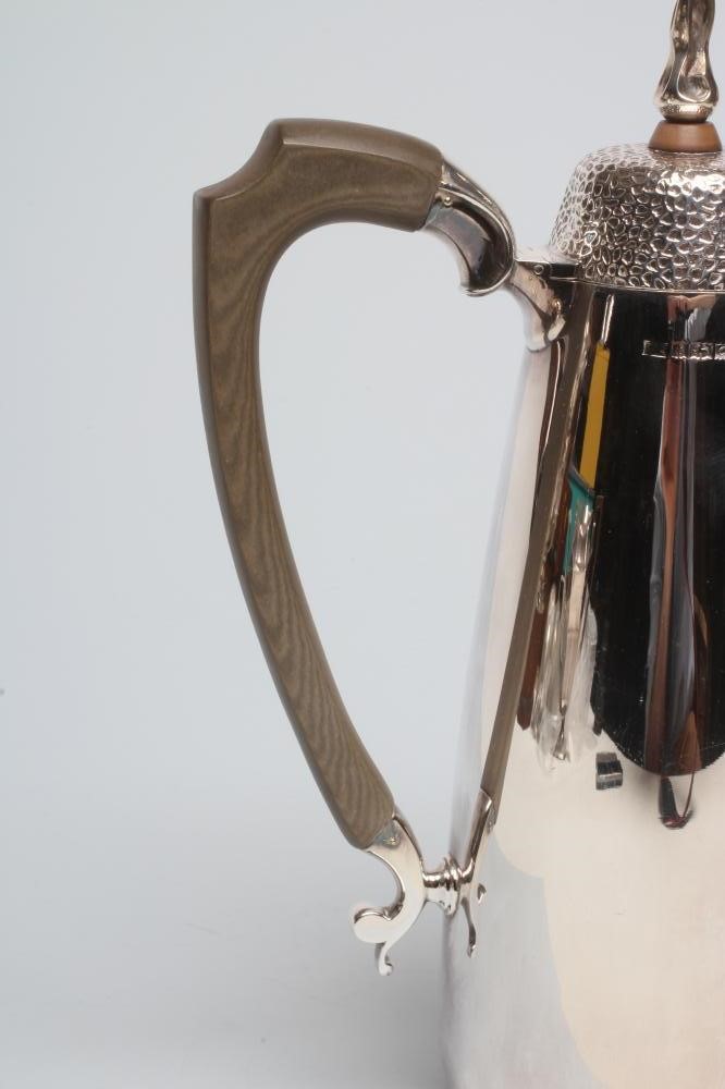 A FOUR PIECE SILVER TEA SERVICE Image